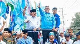 Pasangan calon unggul sementara dalam hitung cepat Pilkada Lombok Utara 2024 dengan raihan 40,76% suara. Mereka mengapresiasi antusiasme masyarakat yang memenuhi jalan untuk memberikan dukungan. (Foto: istimewa)