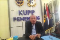 Kepala UPP Kelas II Pemenang, I Made Oka SH., MH, di ruang kerjanya usai menjelaskan langkah pengawasan pelayaran. (Foto: Istimewa)