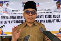  Kepala Dinas Sosial Lombok Barat H. Lalu Winengan menyampaikan komitmen Pemkab Lobar dalam mendukung kelompok rentan melalui program bantuan kursi roda. (Foto: Istimewa)