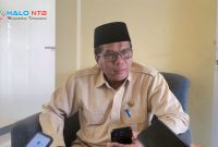 Petugas Kemenhaj Lombok Barat memberikan imbauan kepada masyarakat terkait maraknya penipuan berkedok pengurusan haji.(Foto istimewa)