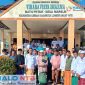 Tokoh masyarakat Lombok Barat, H. Lalu Daryadi (tengah), berfoto bersama keluarga besar umat Budhayana usai menghadiri rangkaian perayaan Tri Suci Waisak di Vihara Virya Dharma, Desa Mareje, Lembar, Lombok Barat, Senin (1/6/2026). (Foto: Istimewa)