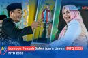 Wakil Gubernur NTB, Hj. Indah Dhamayanti Putri (kanan) menyerahkan piala juara umum kepada Bupati Lombok Tengah, H. Lalu Pathul Bahri (kiri) pada malam penutupan MTQ XXXXI tingkat Provinsi NTB di Bencingah Agung Masmirah, Senin (15/6/2026).(Foto: Istimewa)