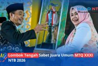 Wakil Gubernur NTB, Hj. Indah Dhamayanti Putri (kanan) menyerahkan piala juara umum kepada Bupati Lombok Tengah, H. Lalu Pathul Bahri (kiri) pada malam penutupan MTQ XXXXI tingkat Provinsi NTB di Bencingah Agung Masmirah, Senin (15/6/2026).(Foto: Istimewa)