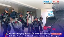 Personel Brimob Polda NTB mengawal tim penyidik Komisi Pemberantasan Korupsi (KPK) saat melakukan penggeledahan di Kantor Bupati Lombok Barat, terkait pengumpulan barang bukti dokumen dalam kasus dugaan korupsi yang menjerat Bupati Lombok Barat.(Foto: Istimewa)