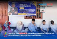 Anggota DPRD NTB H. Suharto (tengah) saat menyampaikan materi sosialisasi penting terkait bahaya pinjaman online ilegal dan judi online di Dasan Geres Tengah, Gerung (25/7/2026).(Foto: Istimewa)