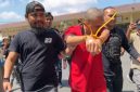 Tim Unit Reaksi Cepat (URC) Puma Jatanras Ditreskrimum Polda NTB menggelandang tersangka BDSP (29), pelaku penipuan yang mencatut nama pejabat kepolisian dengan modus donasi korban kebakaran Desa Adat Sade, Senin (31/8/2026).(Foto: Istimewa) 