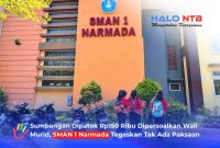 Tampak gedung SMAN 1 Narmada, Kabupaten Lombok Barat, dengan sejumlah siswa berjalan di area sekolah.(Foto: Halo NTB)