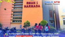 Tampak gedung SMAN 1 Narmada, Kabupaten Lombok Barat, dengan sejumlah siswa berjalan di area sekolah.(Foto: Halo NTB)