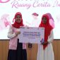 Penyerahan modal usaha bagi kelompok perempuan rentan melalui program “Ruang Cerita Ibu”.